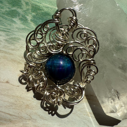 Stillness In The Storm: nebula tigerseye pendant