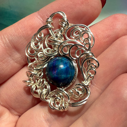 Stillness In The Storm: nebula tigerseye pendant