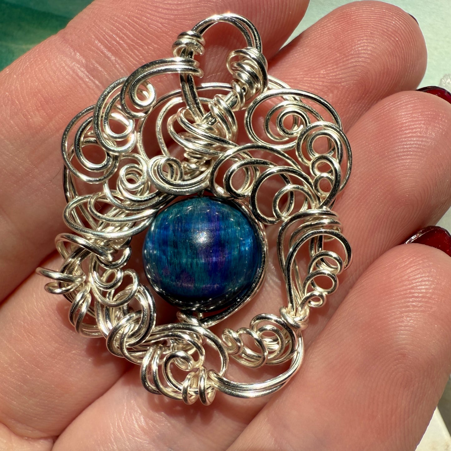 Stillness In The Storm: nebula tigerseye pendant