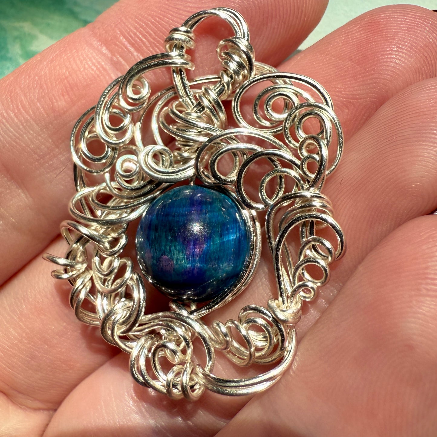 Stillness In The Storm: nebula tigerseye pendant