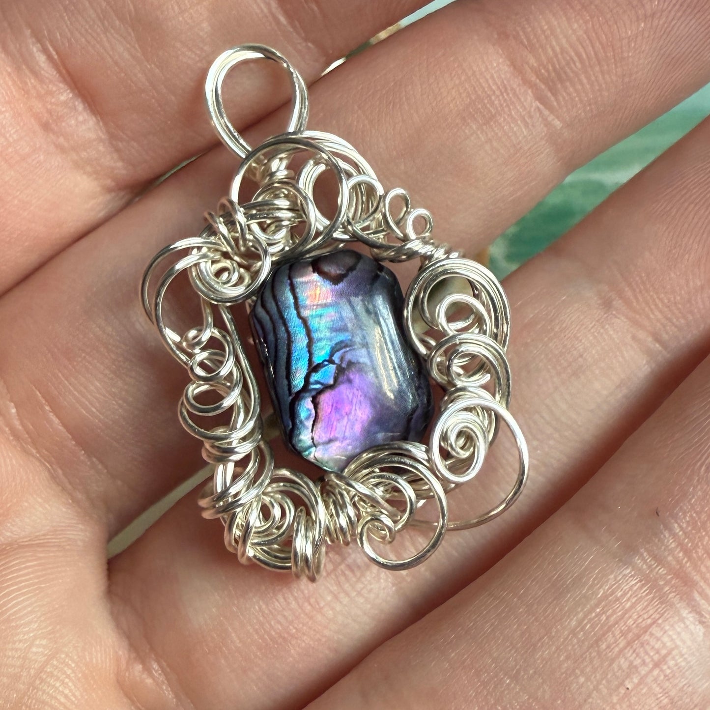 on the turning tide - purple paua shell pendant