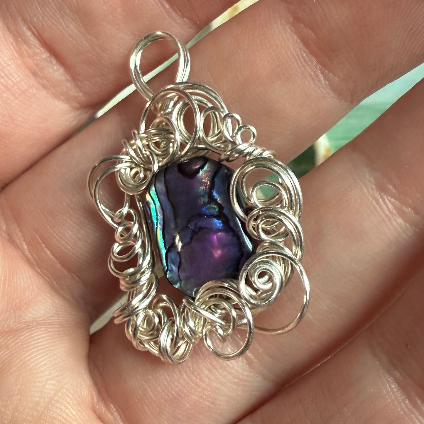 on the turning tide - purple paua shell pendant