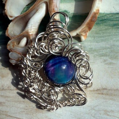 on the turning tide - nebula tigerseye pendant