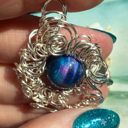 on the turning tide - nebula tigerseye pendant