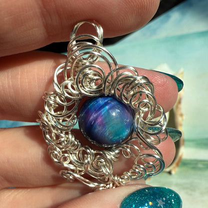 on the turning tide - nebula tigerseye pendant