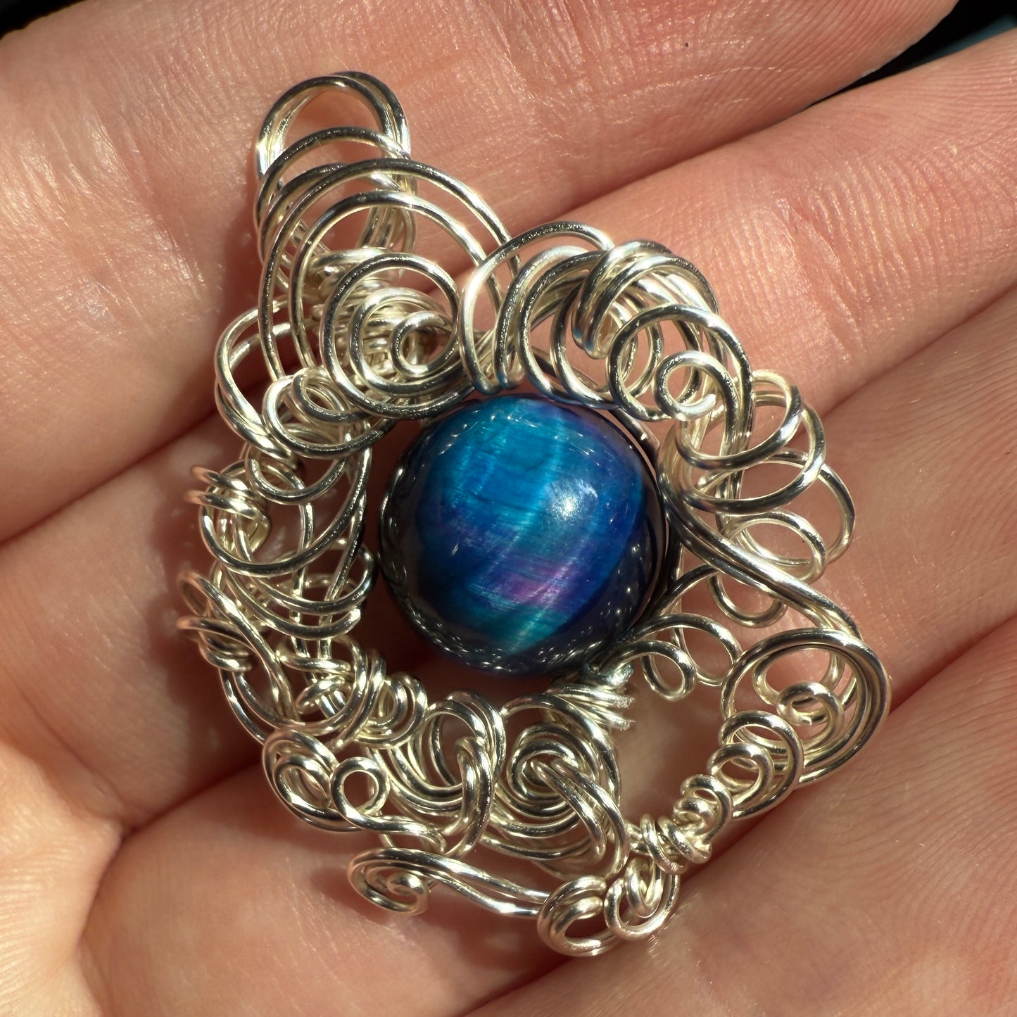 on the turning tide - nebula tigerseye pendant