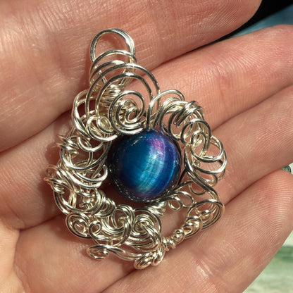 on the turning tide - nebula tigerseye pendant