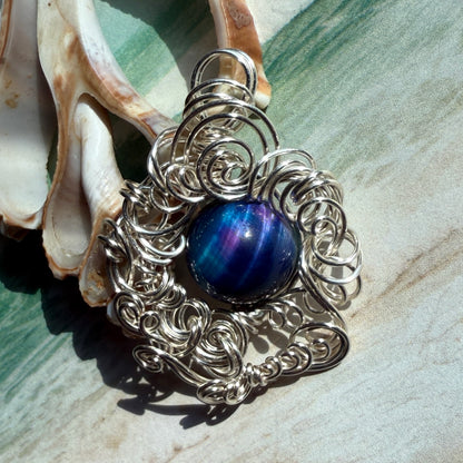 on the turning tide - nebula tigerseye pendant