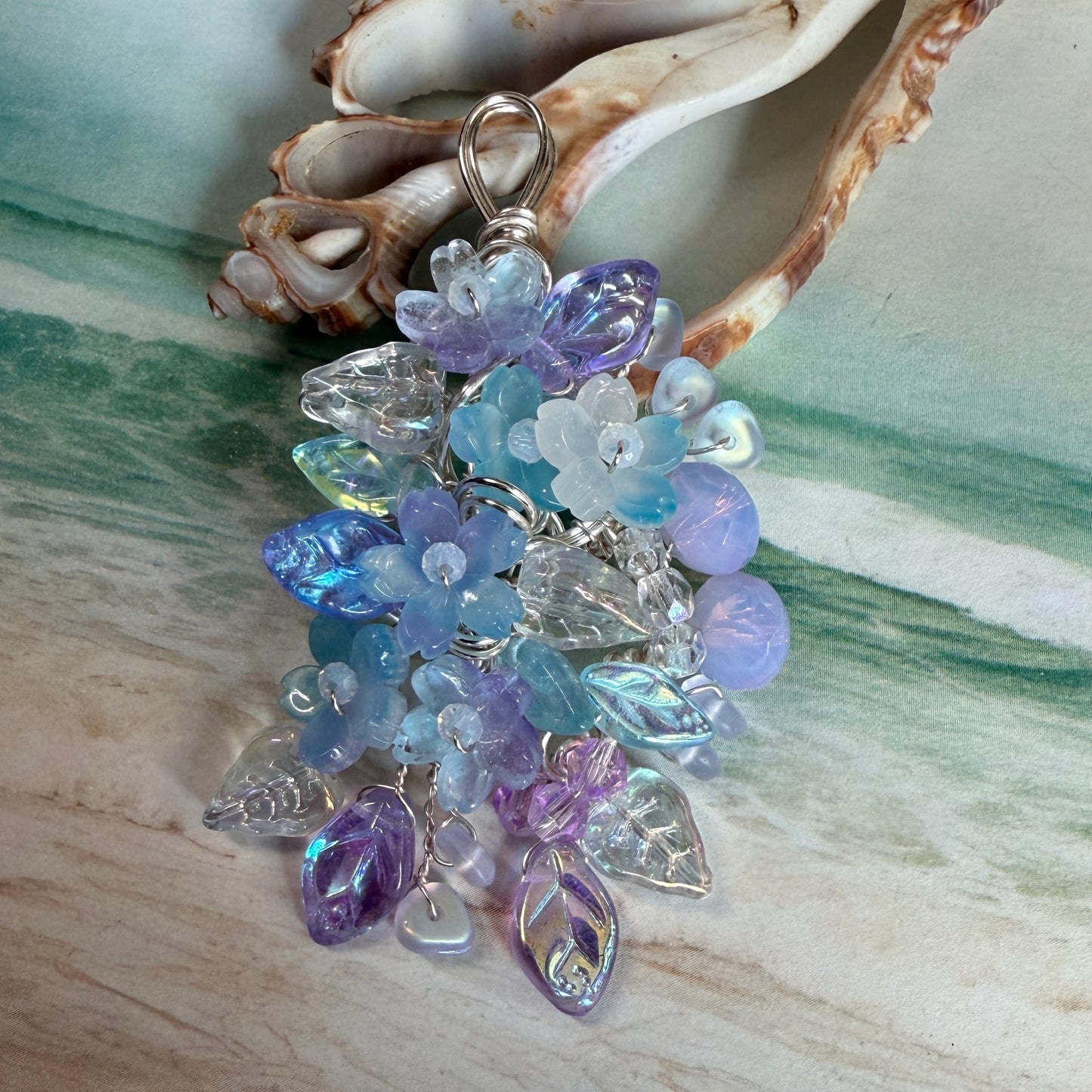 on the turning tide -  mermaid garden pendant