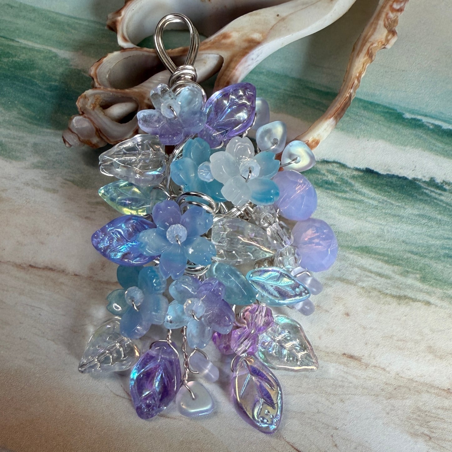 on the turning tide -  mermaid garden pendant