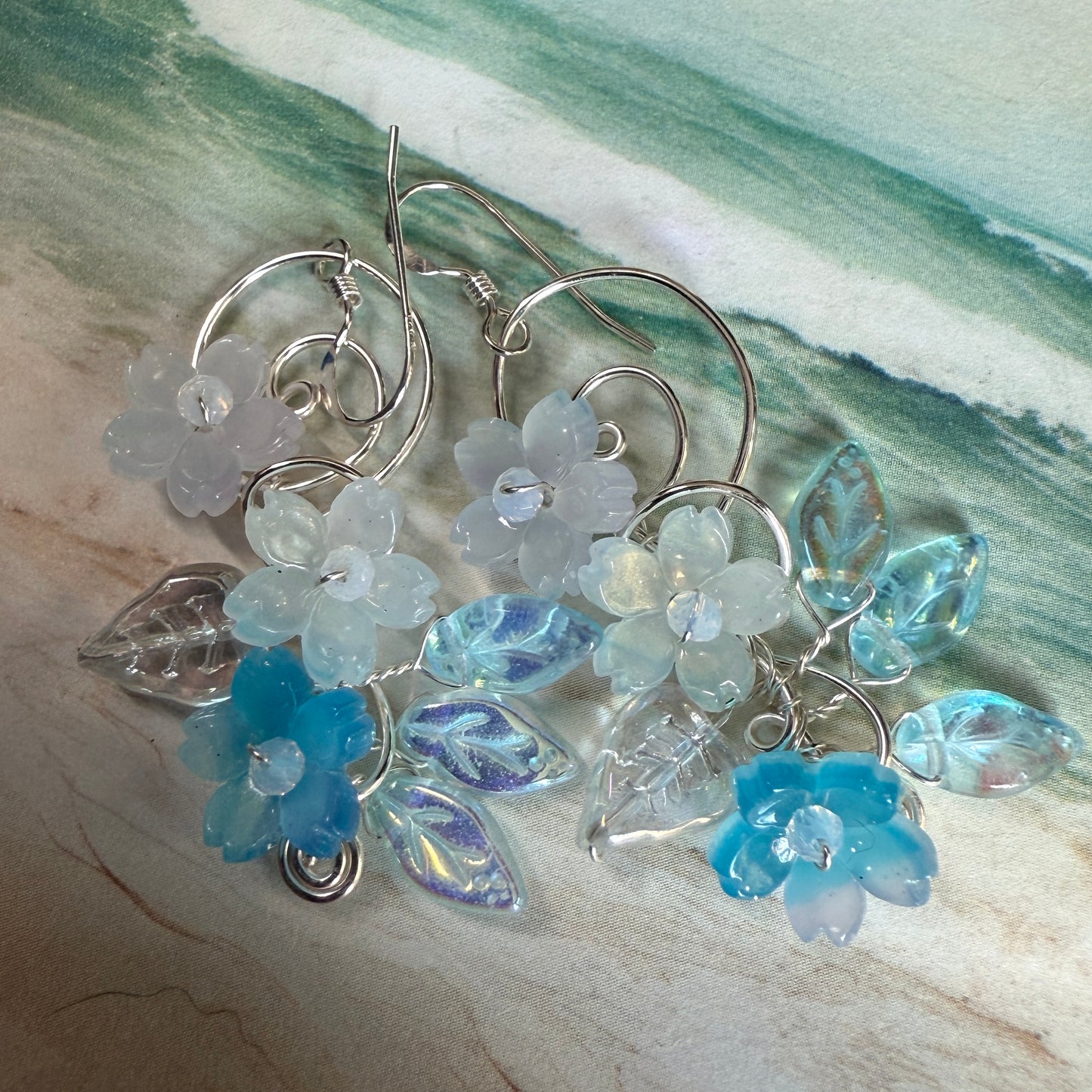 on the turning tide -  blue mermaid garden earrings
