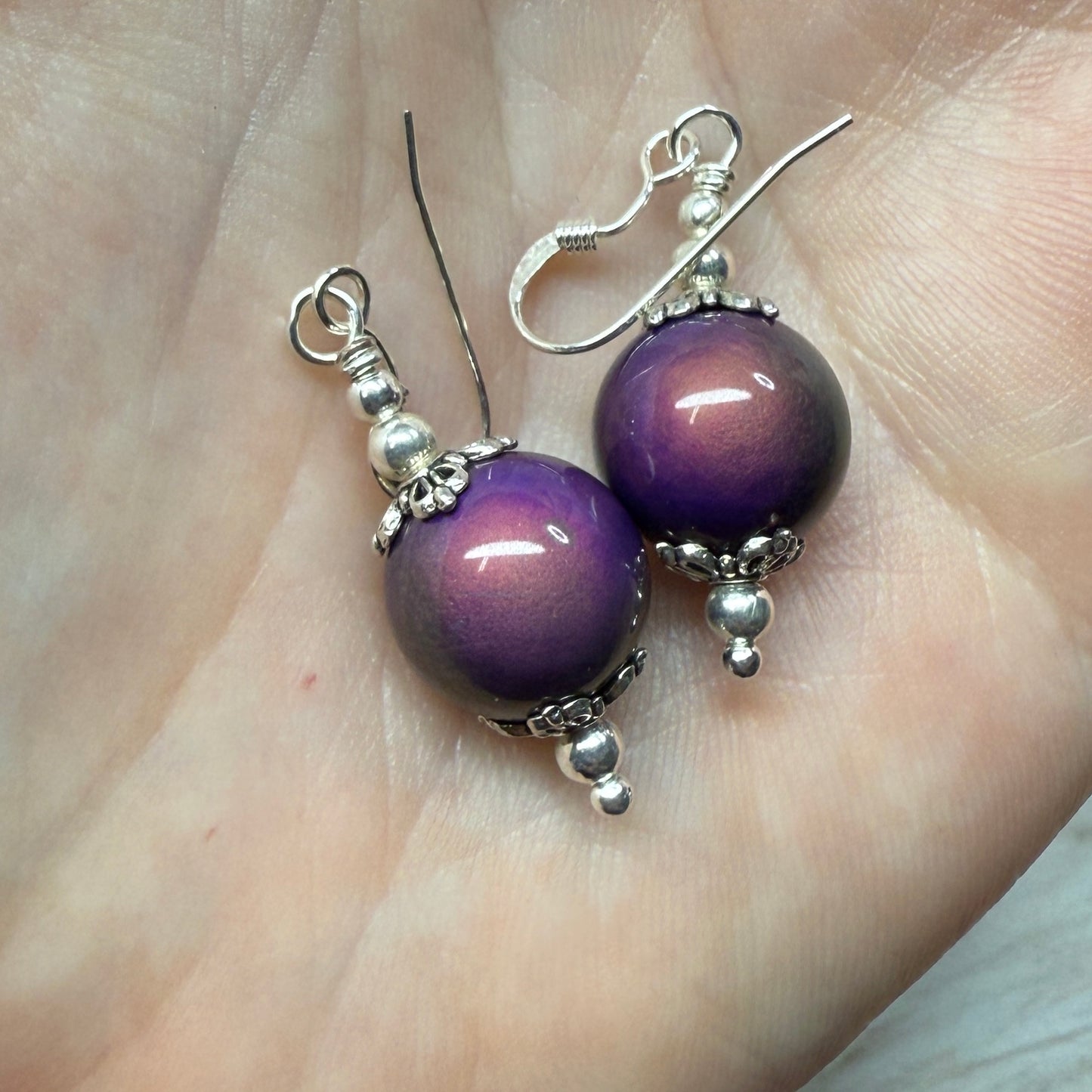 on the turning tide - thermal color-shift earrings