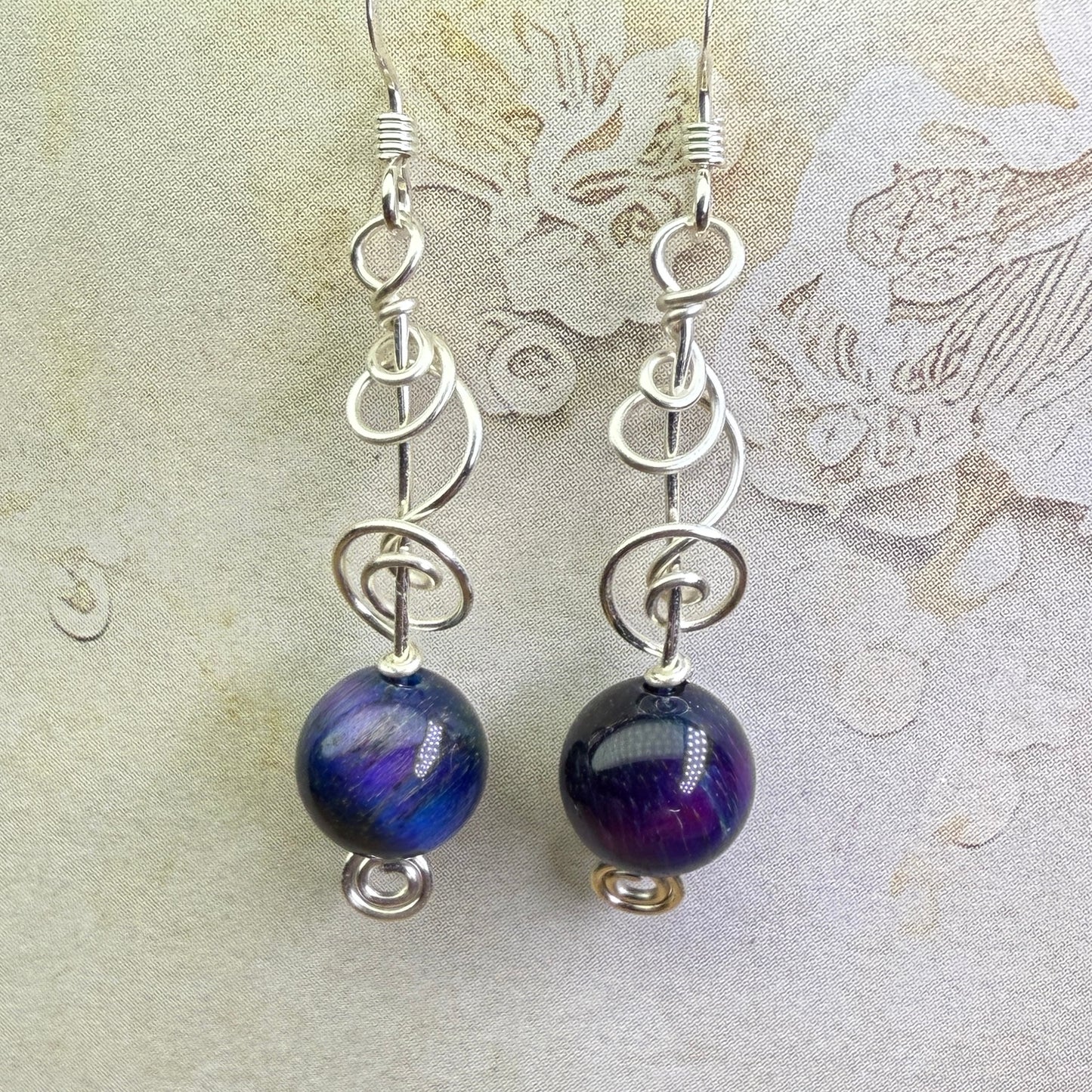 on the turning tide - nebula tigersye earrings