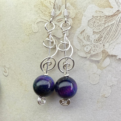 on the turning tide - nebula tigersye earrings