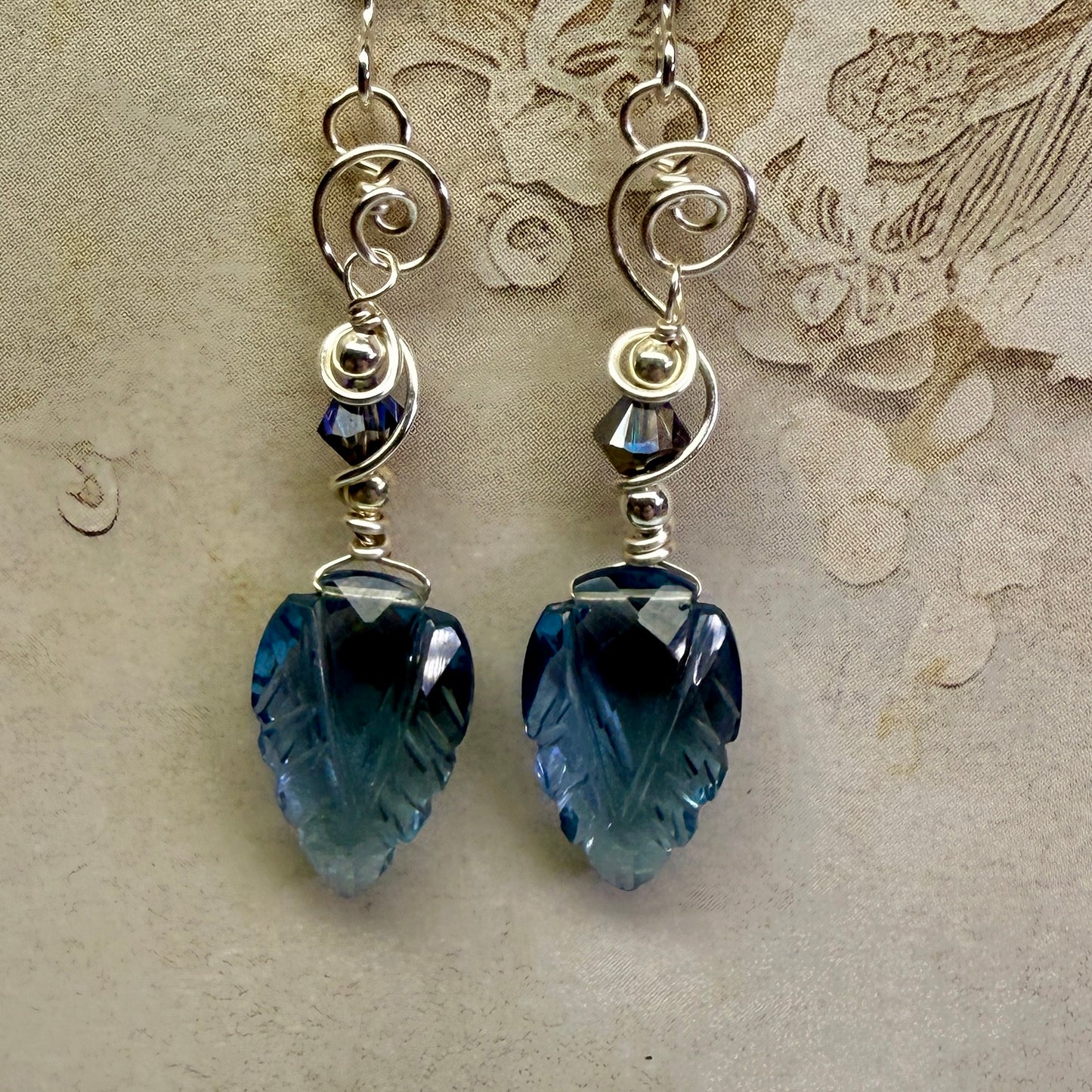 on the turning tide - carved blue earrings
