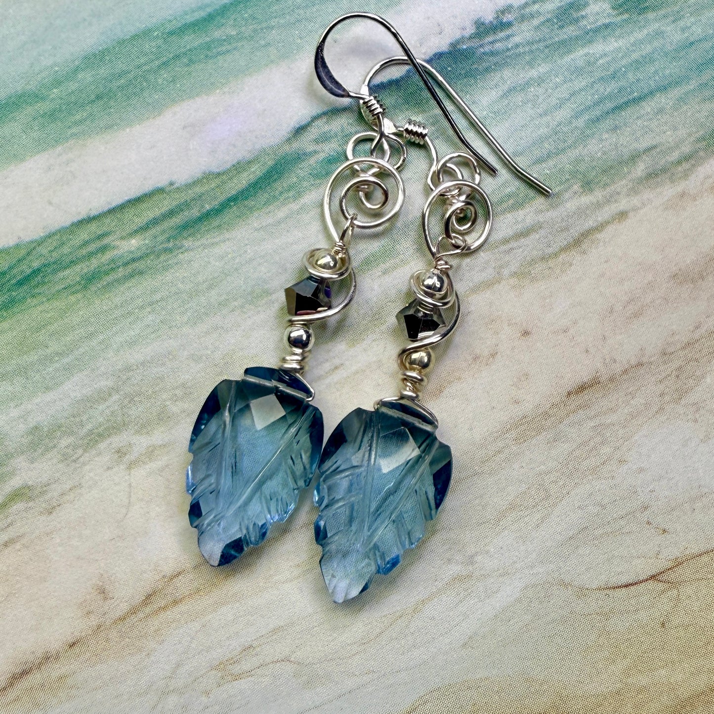 on the turning tide - carved blue earrings