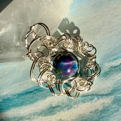 on the turning tide - nebula pendant