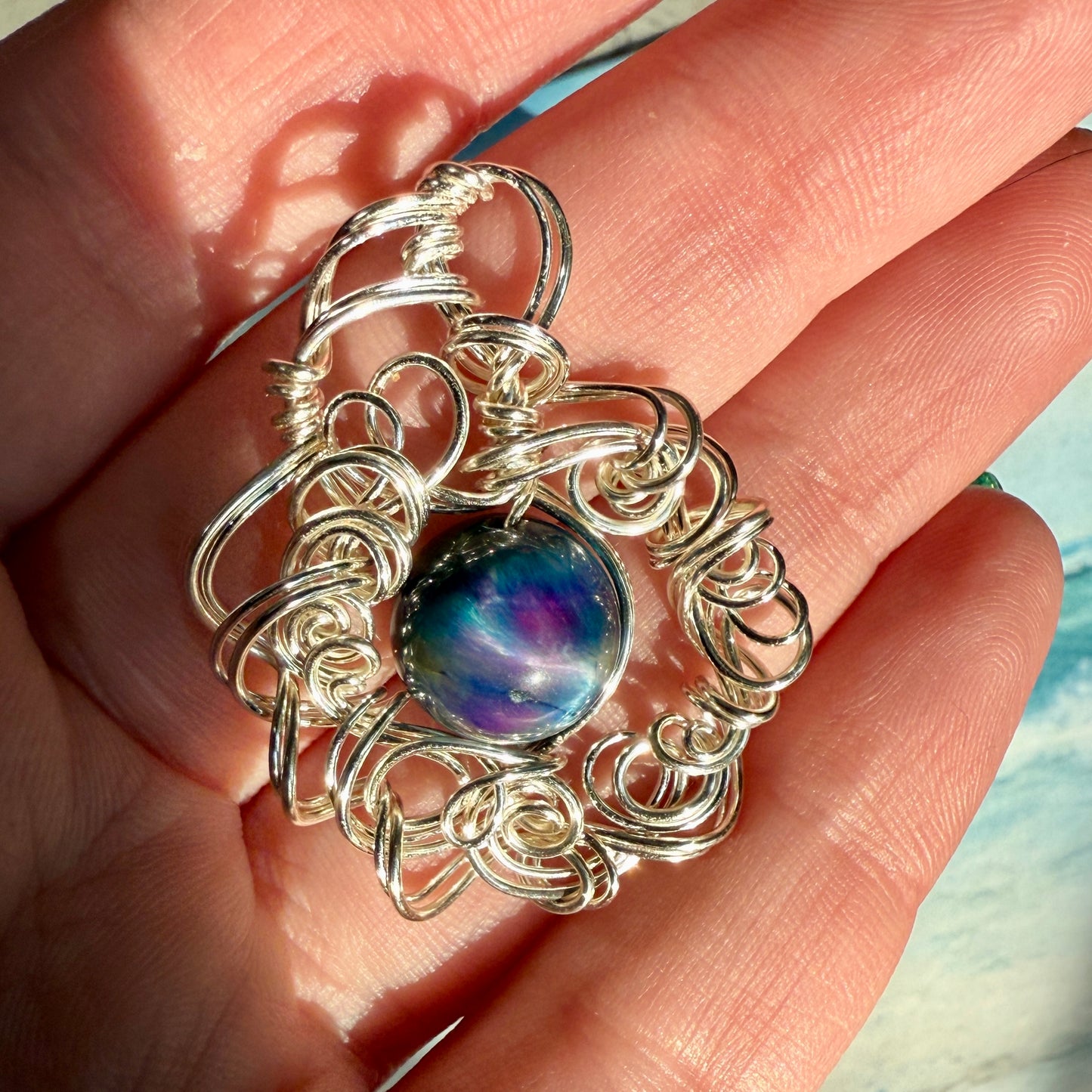 on the turning tide - nebula pendant