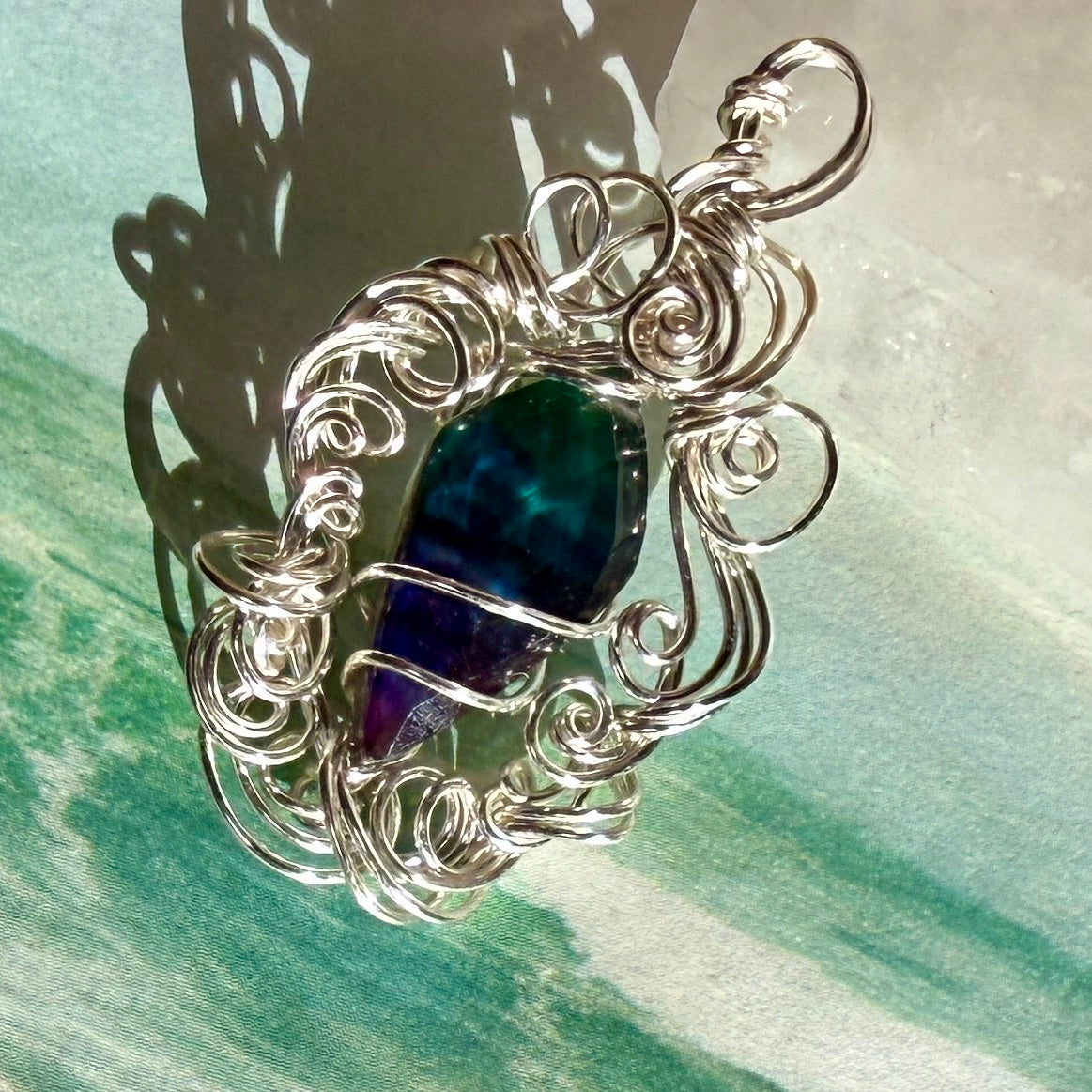 on the turning tide - green & blue aurora pendant