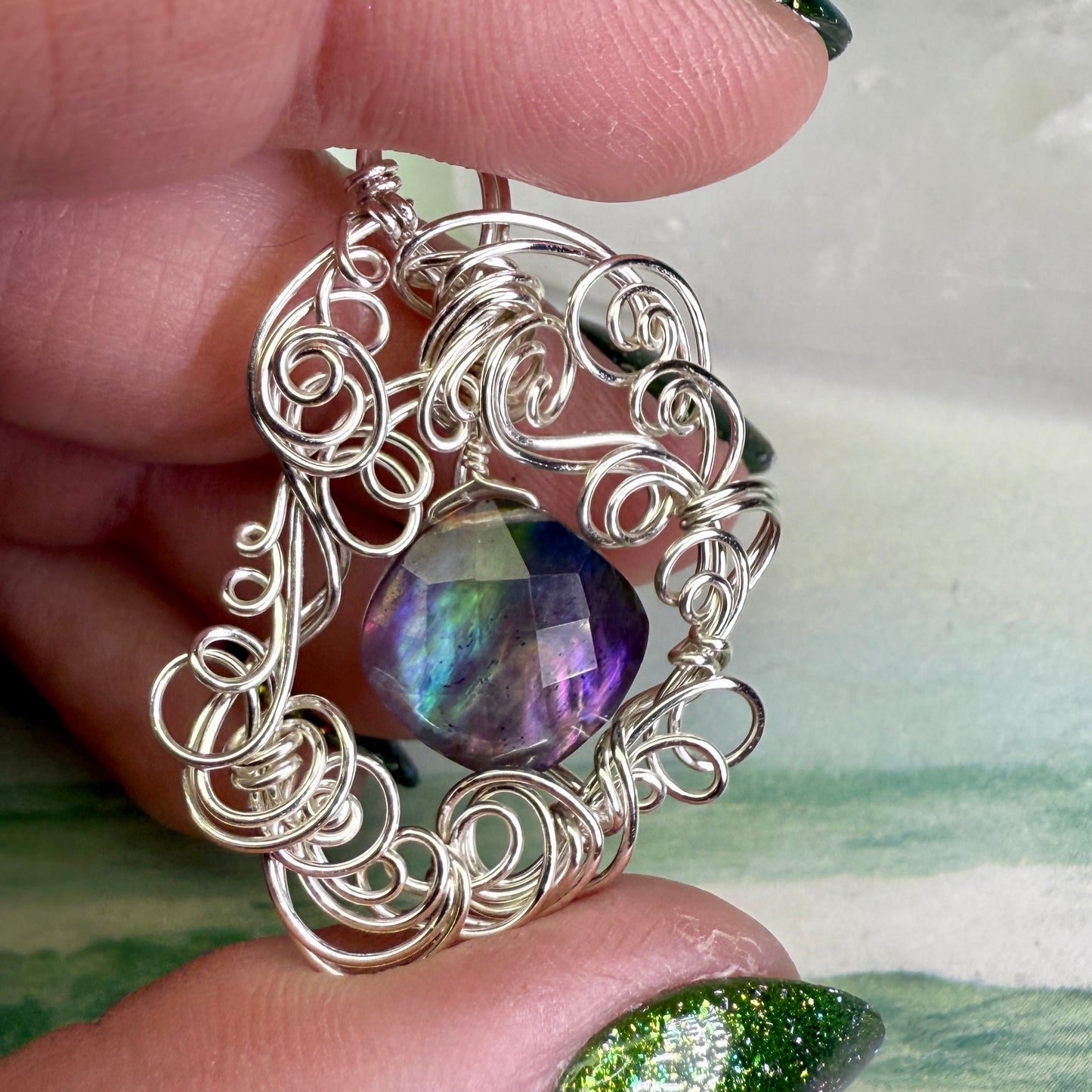 on the turning tide - lighter rainbow aurora pendant