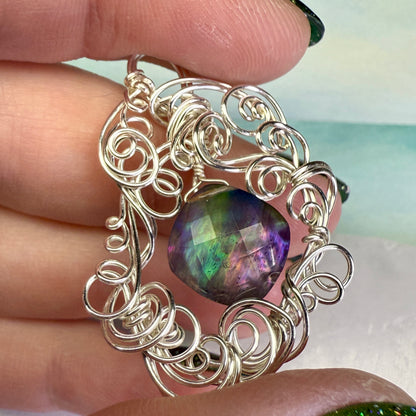 on the turning tide - lighter rainbow aurora pendant