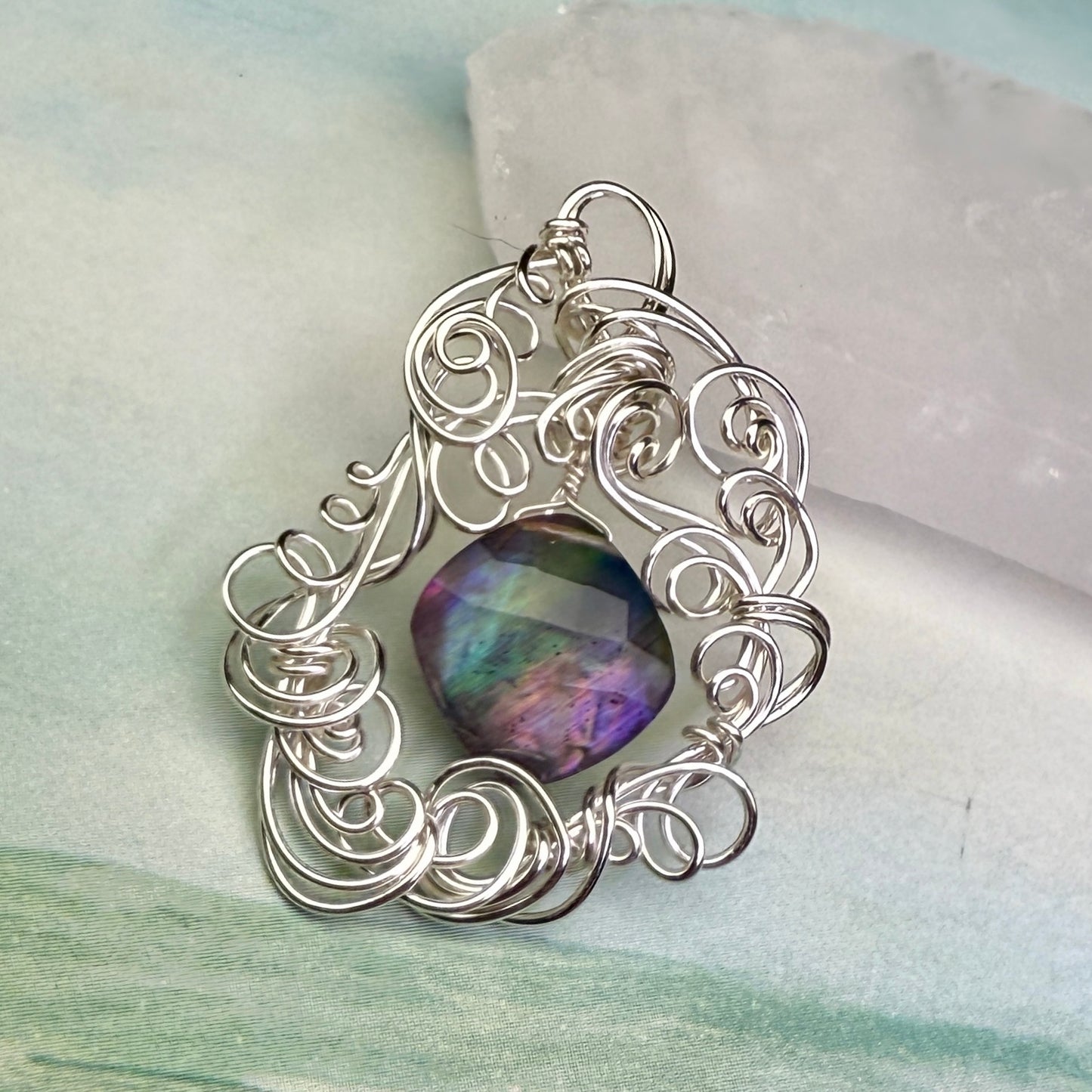 on the turning tide - lighter rainbow aurora pendant