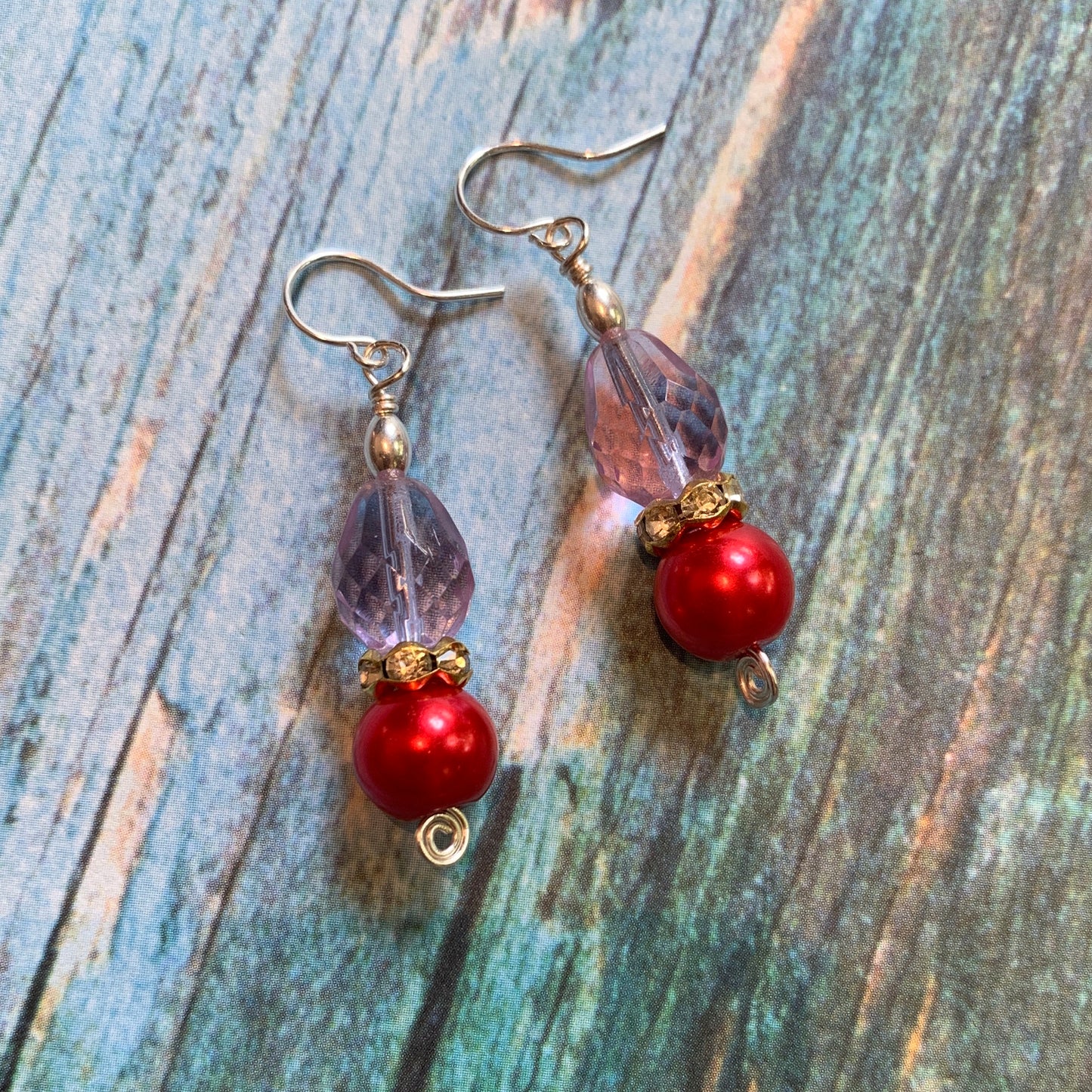 Tiny Evil Genius Earrings: colorshift and coral-red