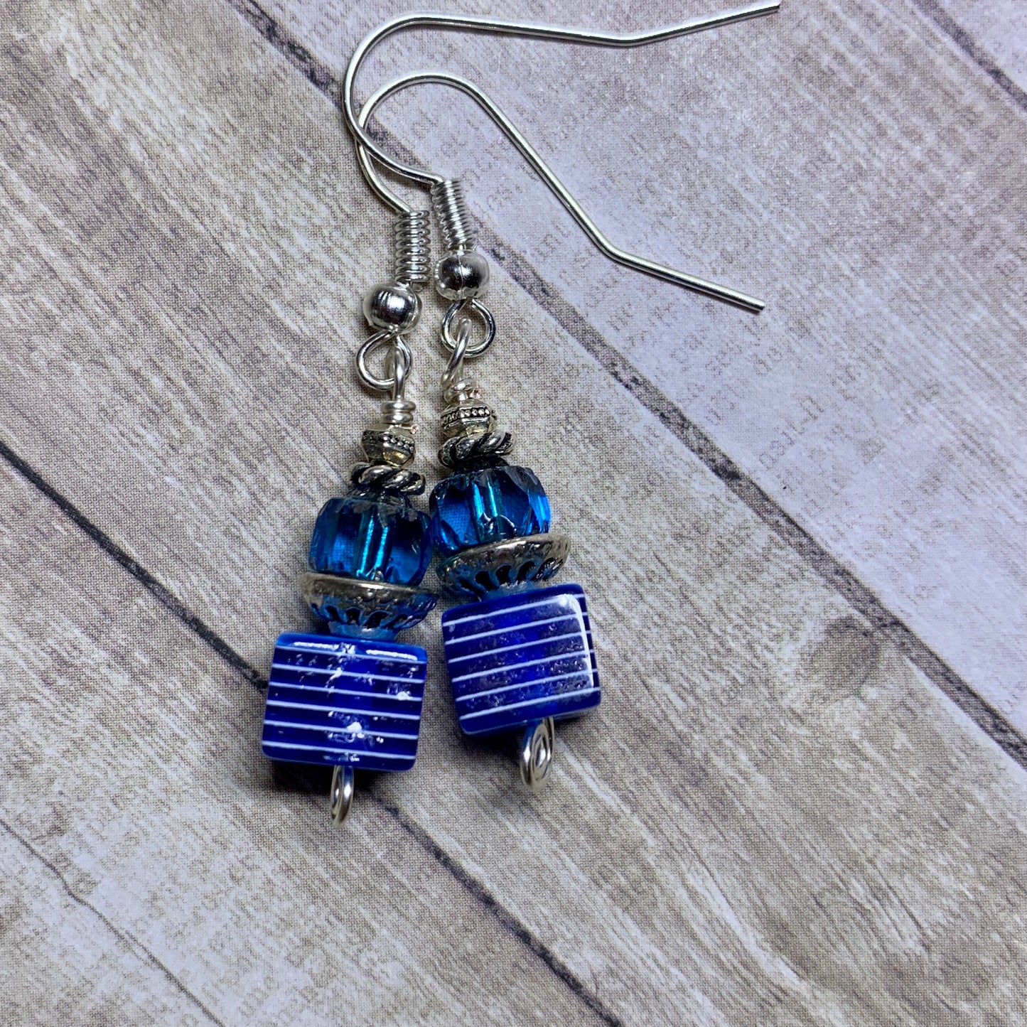 Tiny Evil Genius Earrings: blue stripes