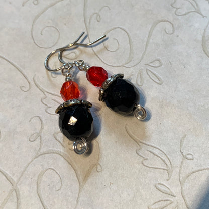 Tiny Evil Genius Earrings: black with two shades of orange
